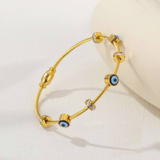 RAIRA Evil Eye Golden Bracelet for Women Stylish Adjustable Golden Kada with Anti-Tarnish Finish Crystal Accents and Magnet Accessories Elegant Evil Eye Bangles for Girls and Women