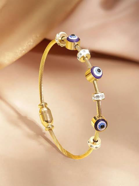 RAIRA Evil Eye Golden Bracelet for Women Stylish Adjustable Golden Kada with Anti-Tarnish Finish Crystal Accents and Magnet Accessories Elegant Evil Eye Bangles for Girls and Women