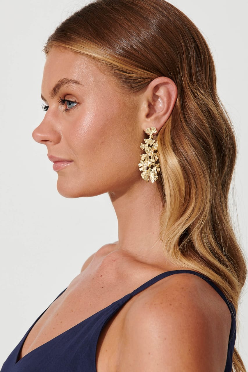 Raira Golden Blossom Statement Earrings – Bold Floral Elegance