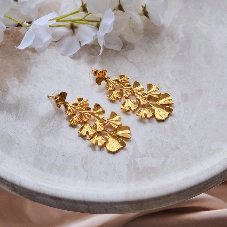 Raira Golden Blossom Statement Earrings – Bold Floral Elegance