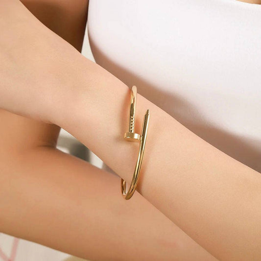 RAIRA Latest Fashion Elegant Stainless Steel Gold Plated Statement Style Nail Kada Bracelet for Women and Girls,