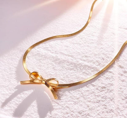 RAIRA Anti Tarnish Gold Plated Bow Necklace– Chic & Elegant Modern Statement Jewelry