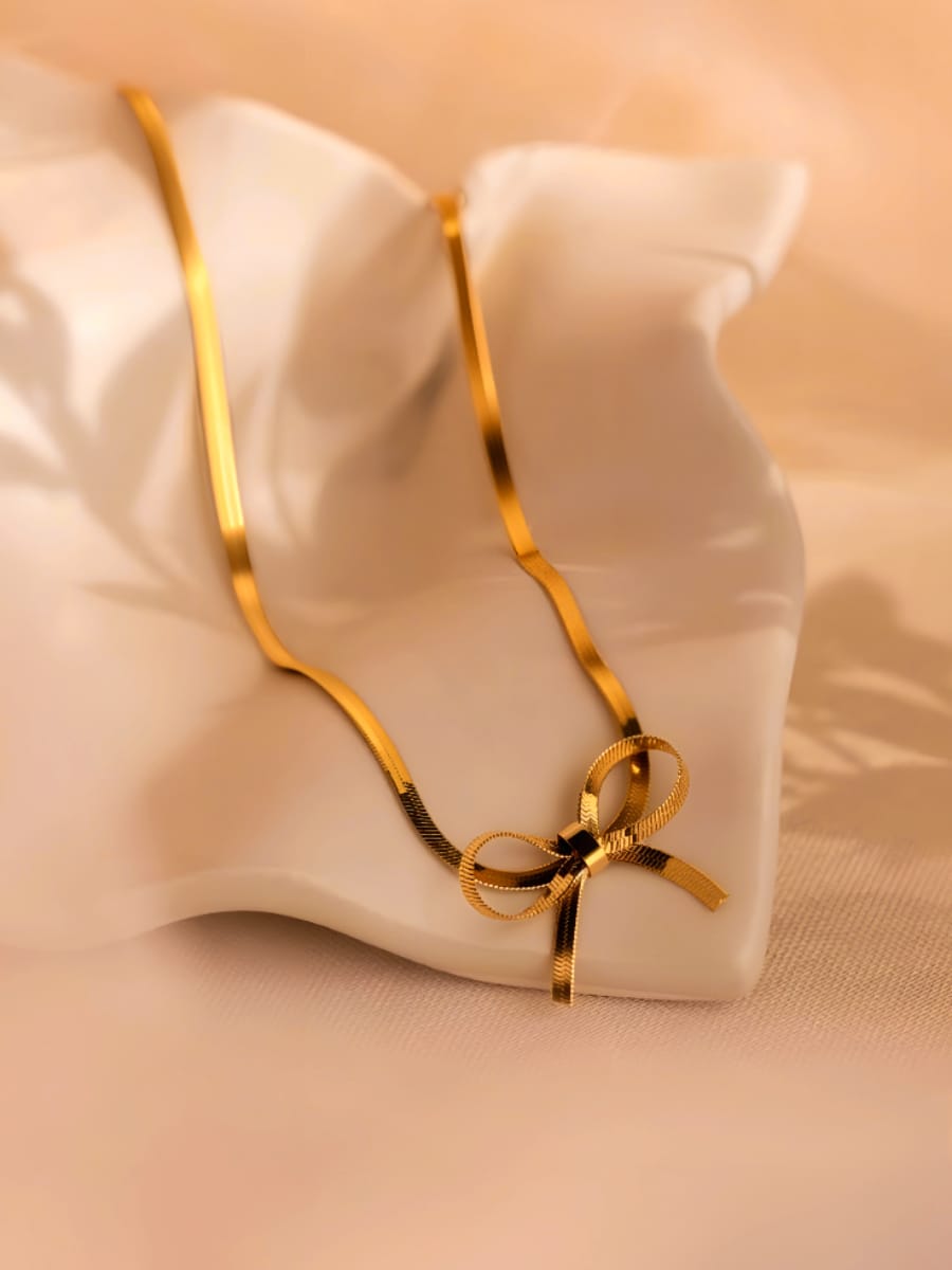 RAIRA Anti Tarnish Gold Plated Bow Necklace– Chic & Elegant Modern Statement Jewelry