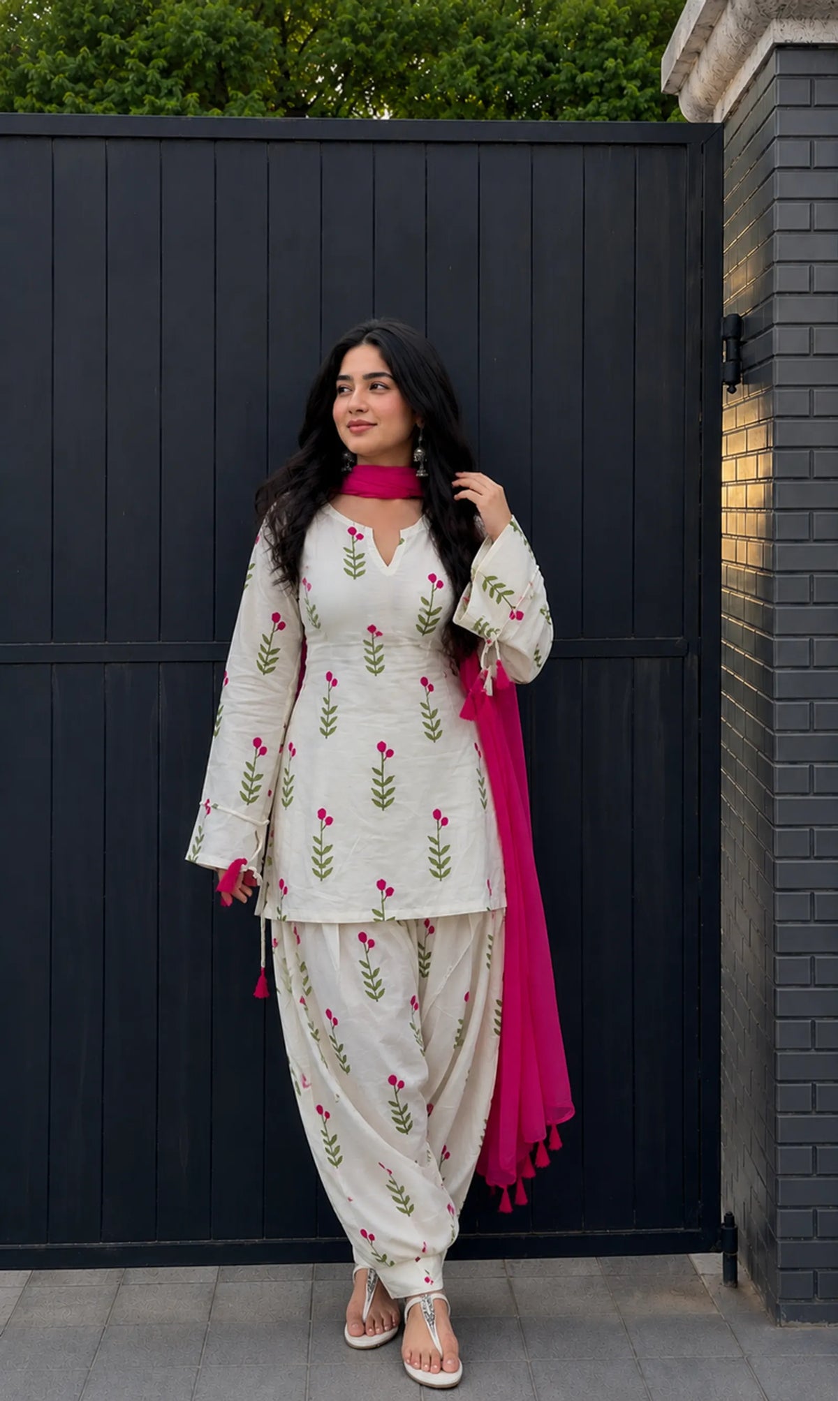 Woman in traditional outfit Farshi Suit Salwar with floral patterns , cotton Kurta set suit
