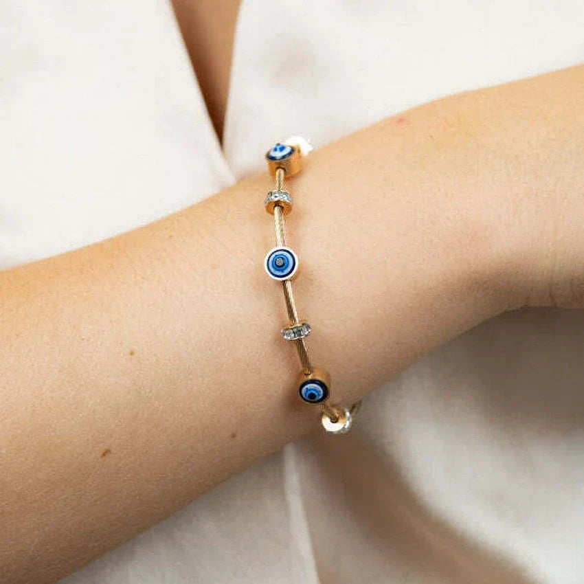 RAIRA Evil Eye Golden Bracelet for Women Stylish Adjustable Golden Kada with Anti-Tarnish Finish Crystal Accents and Magnet Accessories Elegant Evil Eye Bangles for Girls and Women