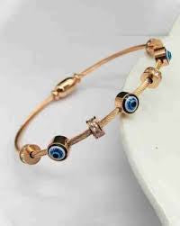 RAIRA Evil Eye Golden Bracelet for Women Stylish Adjustable Golden Kada with Anti-Tarnish Finish Crystal Accents and Magnet Accessories Elegant Evil Eye Bangles for Girls and Women