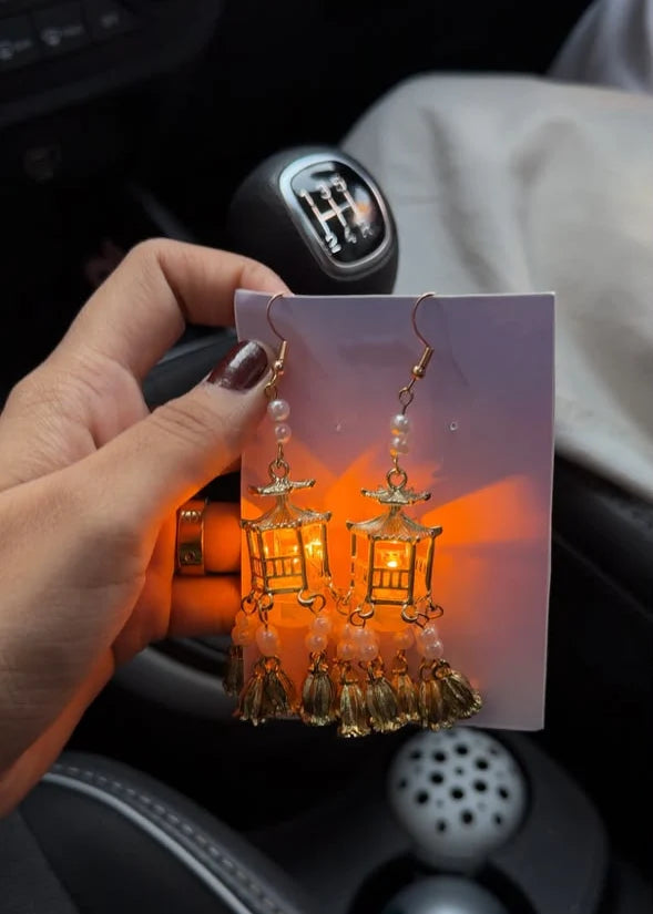 Traditional Lantern LED Earrings or Pagoda Dangle Earrings.  JugMug LED Lantern Jhumka Earrings from RAIRA, Traditional Lantern Pearl Tassel Earrings, Handicraft kottage Pagoda Style Dangle Earrings, Pearl Beads And Tassles Earring For Women & Girls, Vintage Statement Earrings For Wedding, Anniversary, Birthday, Party & Gifting
Traditional Lantern Pearl Tassel Earrings


