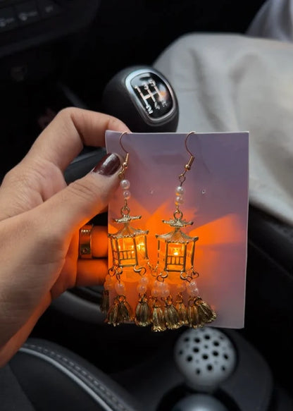 Traditional Lantern LED Earrings or Pagoda Dangle Earrings.  JugMug LED Lantern Jhumka Earrings from RAIRA, Traditional Lantern Pearl Tassel Earrings, Handicraft kottage Pagoda Style Dangle Earrings, Pearl Beads And Tassles Earring For Women & Girls, Vintage Statement Earrings For Wedding, Anniversary, Birthday, Party & Gifting
Traditional Lantern Pearl Tassel Earrings


