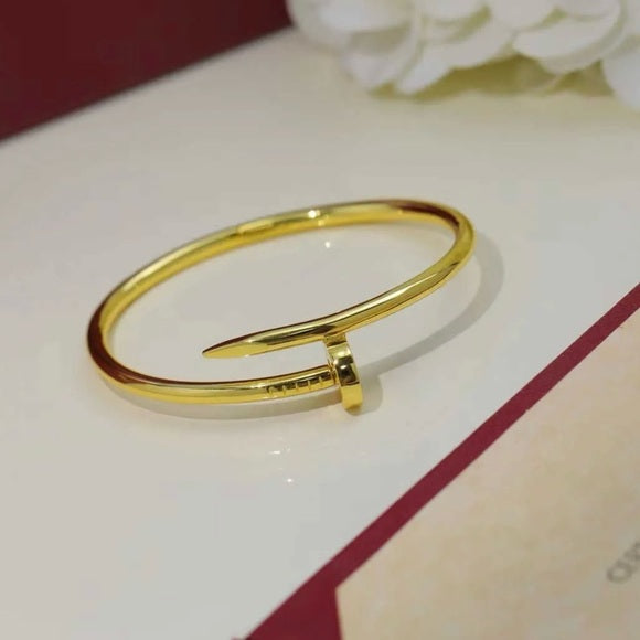 RAIRA Latest Fashion Elegant Stainless Steel Gold Plated Statement Style Nail Kada Bracelet for Women and Girls,